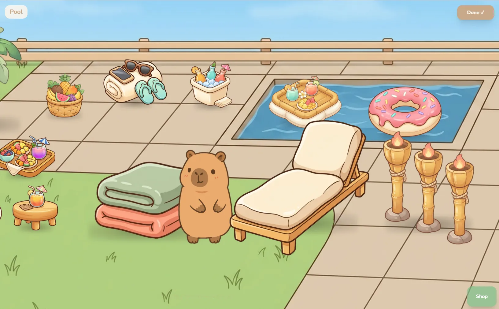 The Pool area, fully decorated with a palm tree, lounge chair, tiki torches, and pool floats
